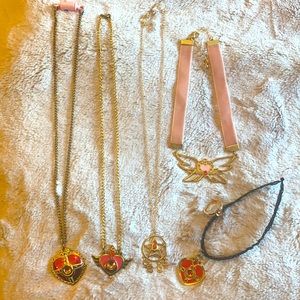 5 Sailor Moon necklaces & 5 rings